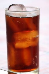 glass of cola with ice