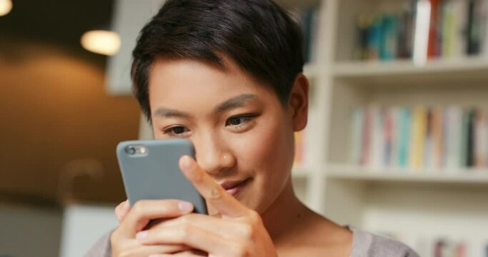 Smartphone, library and student woman social networking, chat notification or online website information for university lifestyle. Campus, bookshelf and studying girl using phone for social media app