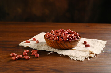 RED Peanuts in wooden Peanuts in a bowl isolated