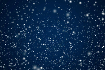 Winter holidays and wintertime background, white snow falling on dark blue backdrop, snowflakes...