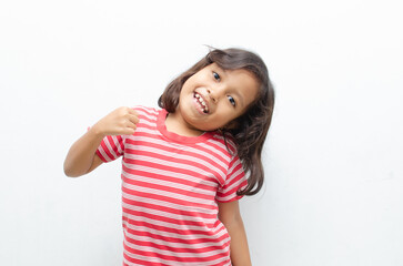 happy smilling asian little girl pose cheerfully with happy surprised expression