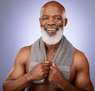 Man, Mature And Shower Towel For Skincare Grooming, Hygiene Maintenance And Cleaning On Purple Studio Background. Portrait, Smile And Happy Middle Aged Black Model In Healthcare Wellness Or Self Care