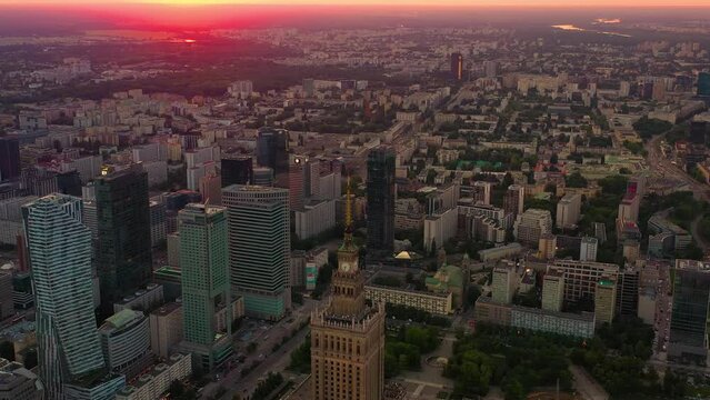 Aerial view of Warsaw downtown. Bird's eye view. Palace of Culture and Science. City at sunset. Skyscraper and skyline.