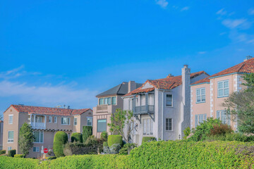 Fototapeta na wymiar Multi-storey homes at a sunny neighborhood in San Francisco California