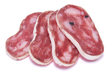 slices of Spanish Fuet thin dried salami sausage isolated on a white background