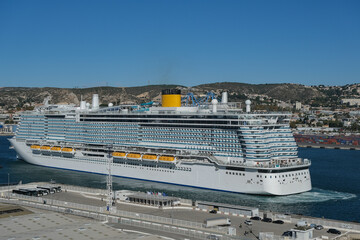 Costa cruiseship or cruise ship liner Toscana in Marseille Provence port on sunny day blue sky...