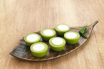 Kue Nona Manis, traditional Indonesian cake made from wheat flour, rice flour, sugar, salt, coconut milk, and pandan leaves, then steamed. 
