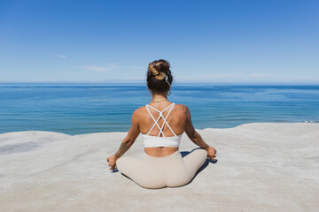 meditating on the beach Gyan Mudra hands