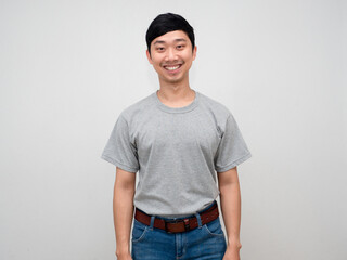 Portrait asian man handsome grey shirt standing happy smile isolated