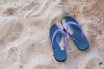 Summer vacation concept--Flipflops on a sandy ocean beach