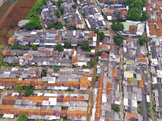 Abstract Defocused Blurred Background aerial view of neatly arranged residents' houses in the Cikancung area - Indonesia. Not Focus