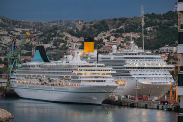 Phoenix cruiseship Artania and Costa cruise ship liner Pacifica for maintenance repair overhaul dry dock service work in port of Marseille Provence, France