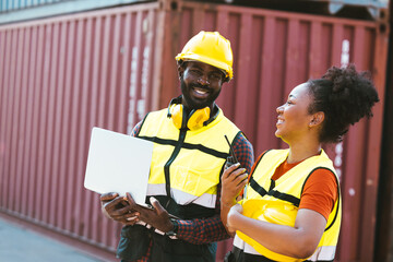 Teamwork, African worker couple happy working together port cargo shipping industry container yard