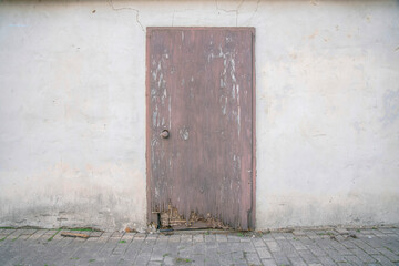 San Antonio, Texas- Weathered wooden door of an abandoned building
