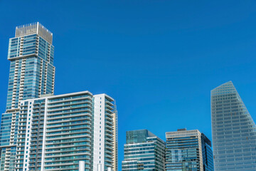 Obraz na płótnie Canvas Austin, Texas- Modern condominium and apartment buildings with different structures against the sky