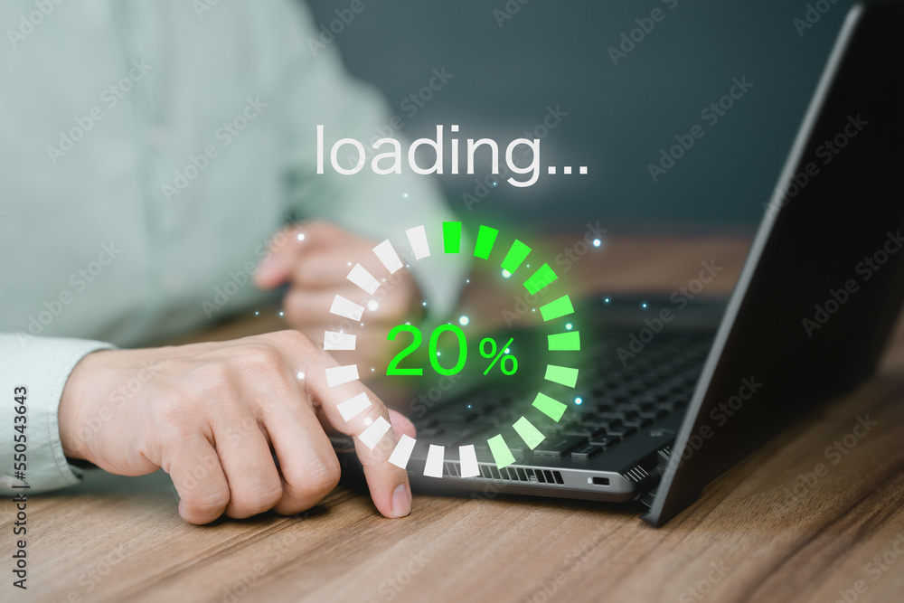 Poster Man using laptop for download software and waiting to loading digital business data form website, concept of waiting for load of loading bar.