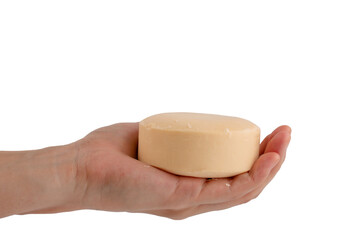 Hand holding soap on transparent background