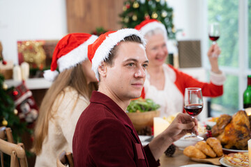 Merry Christmas,Happy family are having dinner at home,Celebration holiday and togetherness,Happy New Year.