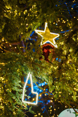 STRASBOURG, FRANCE - December 2021 - Christmas tree decorations in place Kleber with Cathedral...
