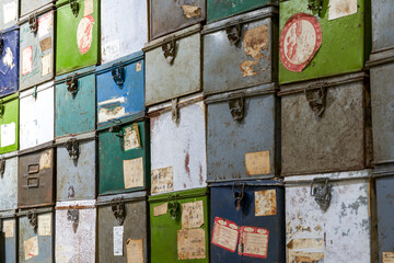 Retro old movie film storage boxes all over the wall.
Translation: Guangxi Film Studio.