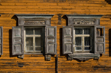Windows with beautiful wooden architraves - obrazy, fototapety, plakaty