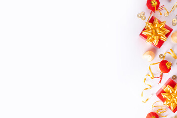 Chinese New Year on white background. Lunar New Year greeting card with traditional festival decoration - ginkgo biloba, golden twigs, gift boxes, red berries, gift envelopes, coins, chinese lanterns