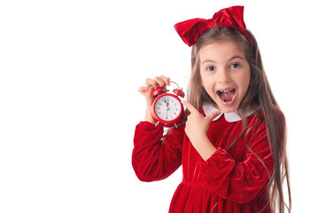 Christmas woman in Santa Claus dress posing with red alarm clock, midnight time for holidays...
