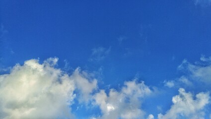 Sky background with clouds, blue sky in cold weather, vibrational focus, nature
