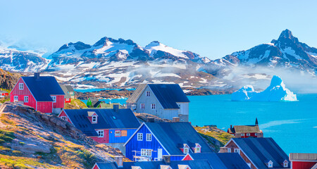 Picturesque village on coast of Greenland - Colorful houses in Tasiilaq, East Greenland - obrazy, fototapety, plakaty