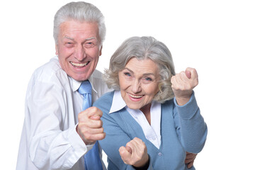 Portrait of happy senior couple gesturing