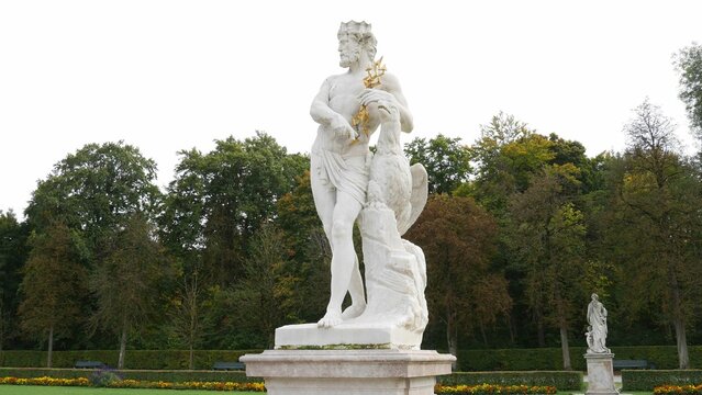Mythological statue of Greek god Jupiter at Nymphenburg palace gardens, by Dominik Auliczek