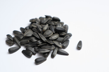 Heap of Sunflower Seeds on a white background.