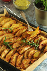 A tray with potatoes backed in oven