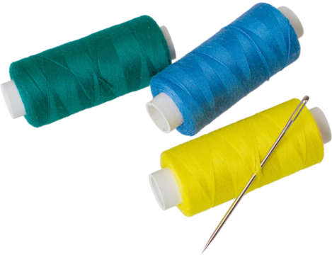Spools of thread and a sewing needle