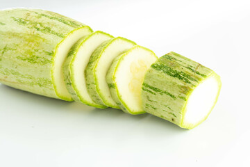 sliced fresh green cucumber isolated on a white background
