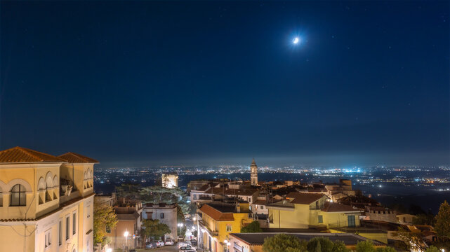 Lanuvio, Italy at night. City under night sky stars