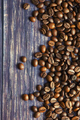 Spilled coffee beans on the table.