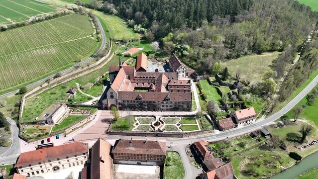 Aerial of Bronnbach Abbey with garden, Baden-Wurttemberg, Germany