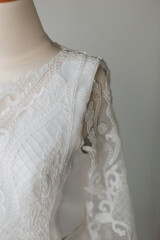Beautiful left shoulder detail white wedding dresses for the bride at the wedding.