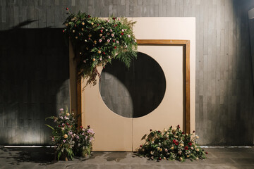 Flower decoration outdoor at night for background photo shot or photo booth at wedding reception.