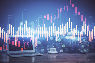 Forex Chart hologram on table with computer background. Multi exposure. Concept of financial markets.