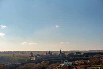 part of autumn
natural landscape with a view of space;
Kamianets-Podilskyi fortress — a fortress in the city of Kamianets-Podilskyi