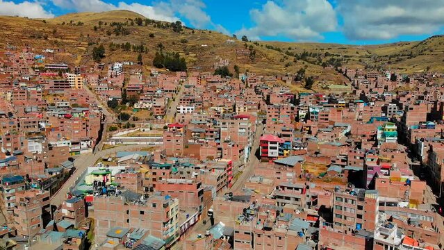 Drone shot of Puno region Peru,  Peruvian Andes,El Altiplano, native Peruvian town, poorest regions in Peru,  extreme poverty.ALTIPLANO,lakeside communities of Titicaca