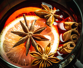 Red mulled wine with spices. Classic Christmas drink. View from above.