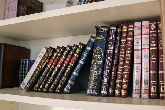 A pile of ancients
 Jewish Talmud and Gemara books was photographed in Israel. placed on top of each other in a close-up shot