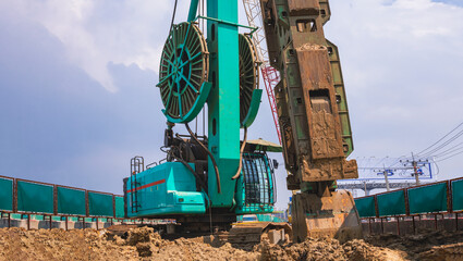 Earth drilling crawler crane with hydraulic diaphragm wall equipments working in road construction...