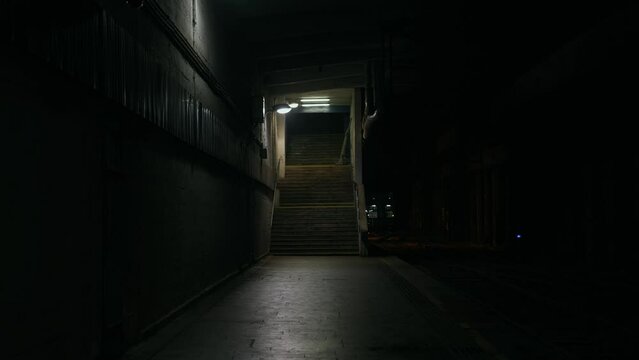 Abandoned railway / subway platform. Ghetto. Rainy autumn foggy weather in the night city. Gotham city mood. Cinematic style. Dungeon columns and dim light. Graffiti on the walls. Concrete stairs