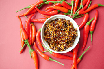chili and garlic flakes in a container 