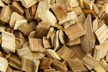 Wood chips for smocking texture background. Natural wood smoking chunks, top view
