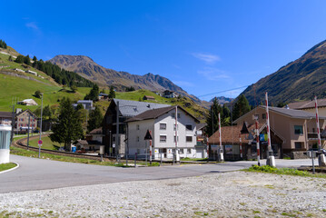 Fototapeta na wymiar Scenic view of mountain panorama with Nätschen and cable car at mountain village Andermatt on a sunny late summer day. Photo taken September 12th, 2022, Andermatt, Switzerland.